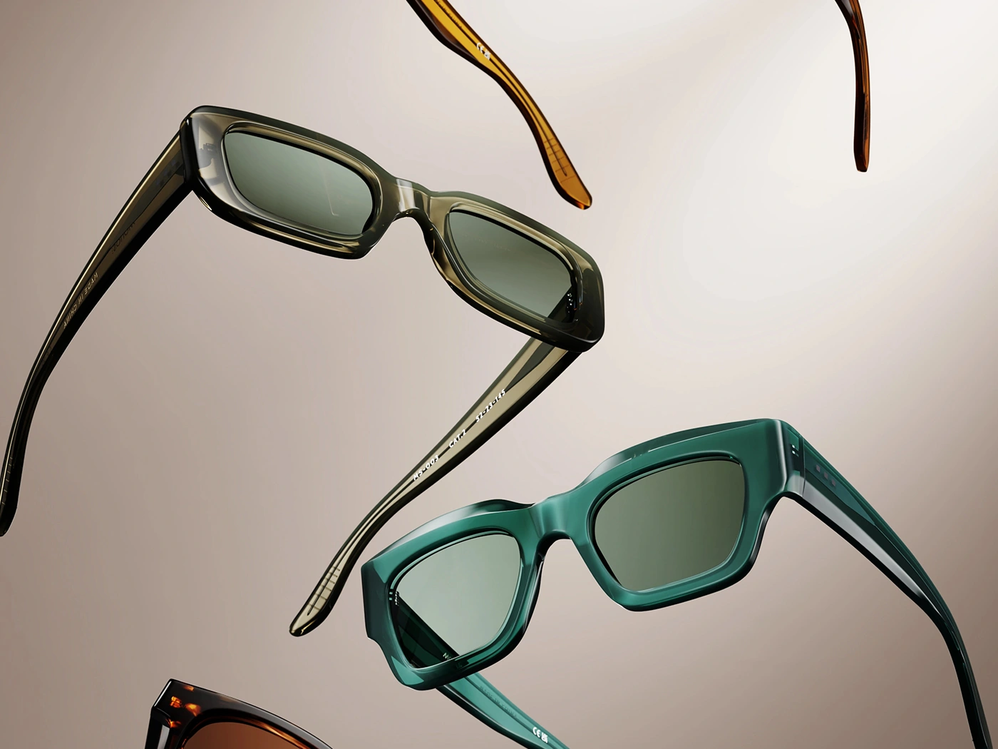 Sunglasses shown in multiple colorway variants floating side by side, rendered in 3D