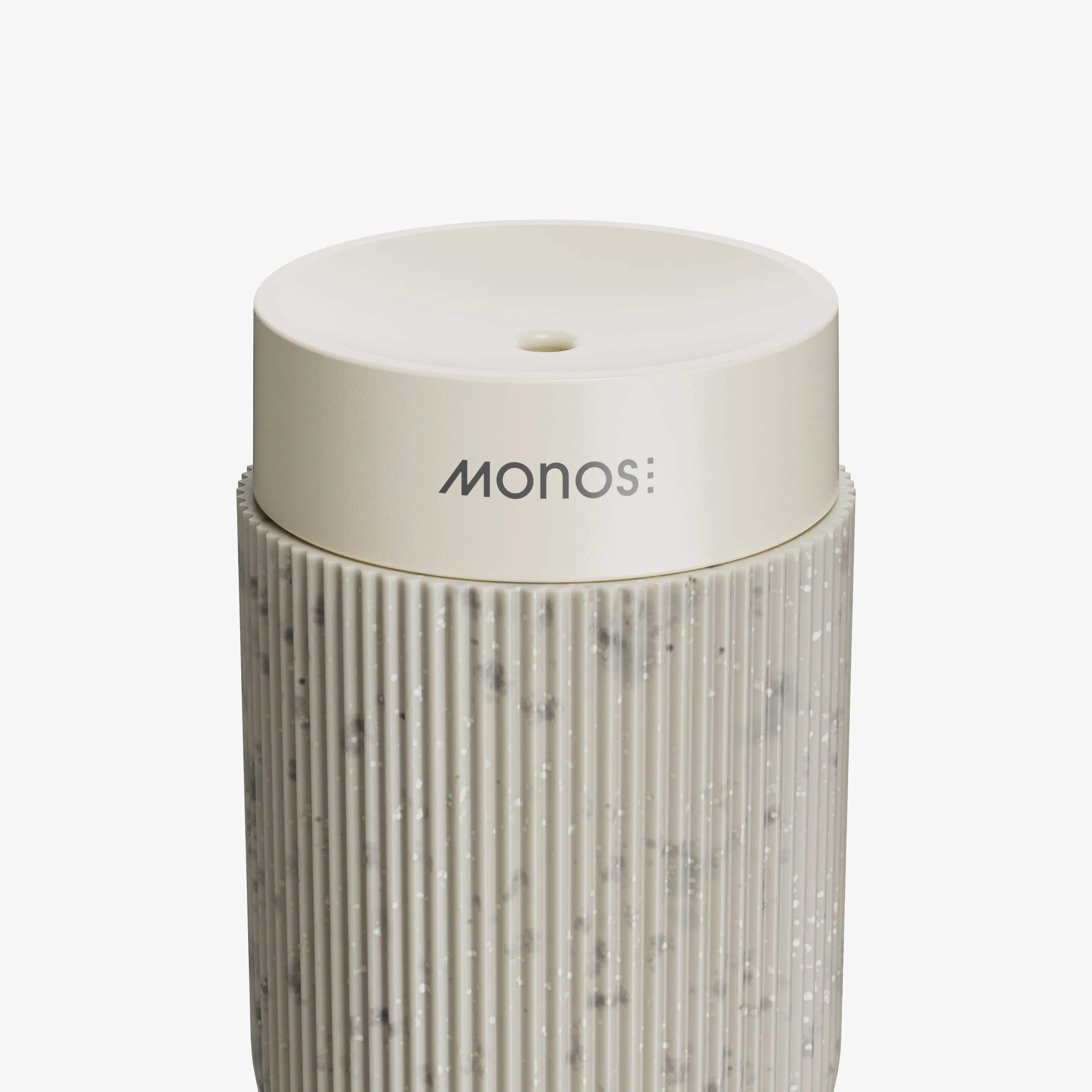 Close-up of the Omoko diffuser's cream top and mist opening