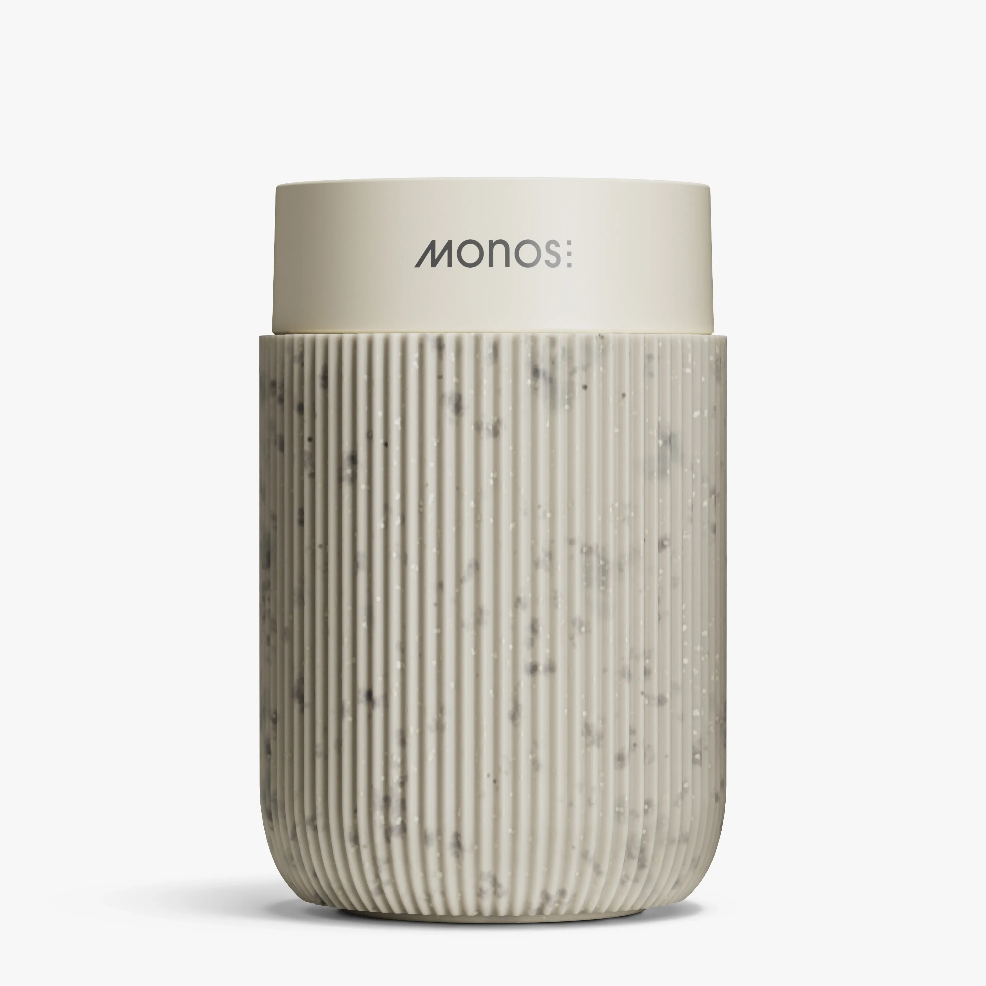 3D render of a Monos Omoko aroma diffuser with a ribbed speckled terrazzo base and cream top