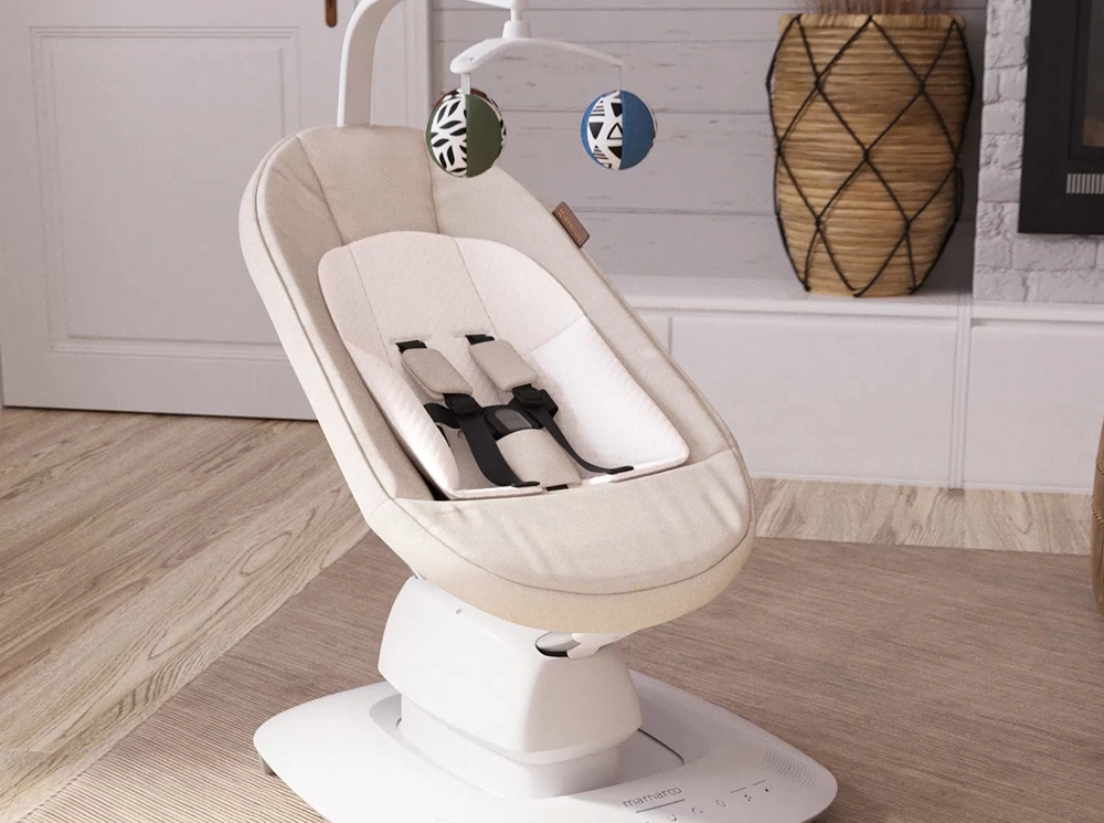Smart baby swing staged in a cozy, styled living room scene